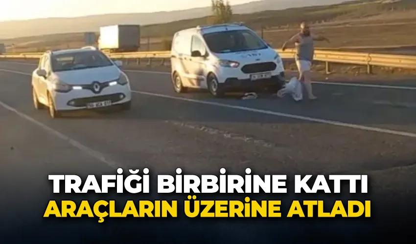 Trafiği birbirine kattı, araçların üzerine atladı, cam kırdı