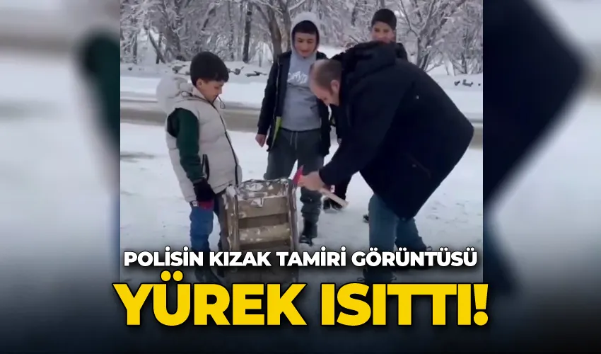 Polisin kızak tamiri görüntüsü yürek ısıttı