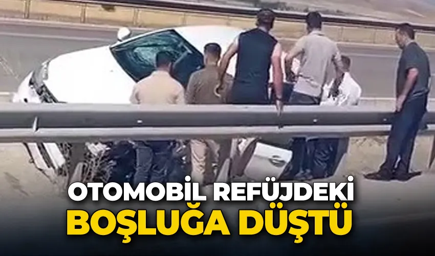 Otomobil refüjdeki boşluğa düştü